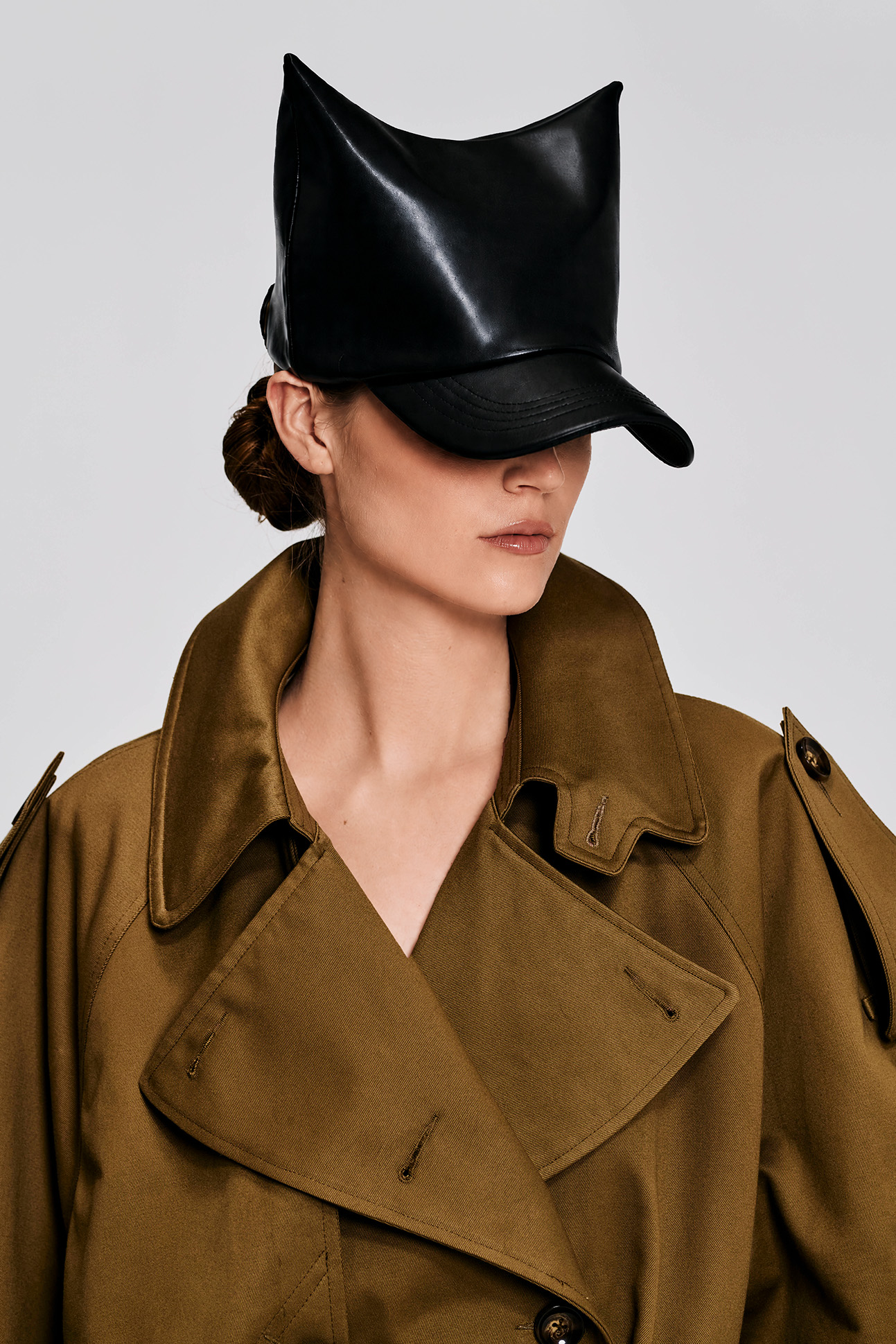 black-faux-leather-sculptural-hat-campaign-kimc-studio.jpg
