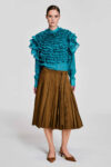 Model wearing a camel khaki cotton wrap skirt with adjustable waist rings and long string ties by KimC Studio.