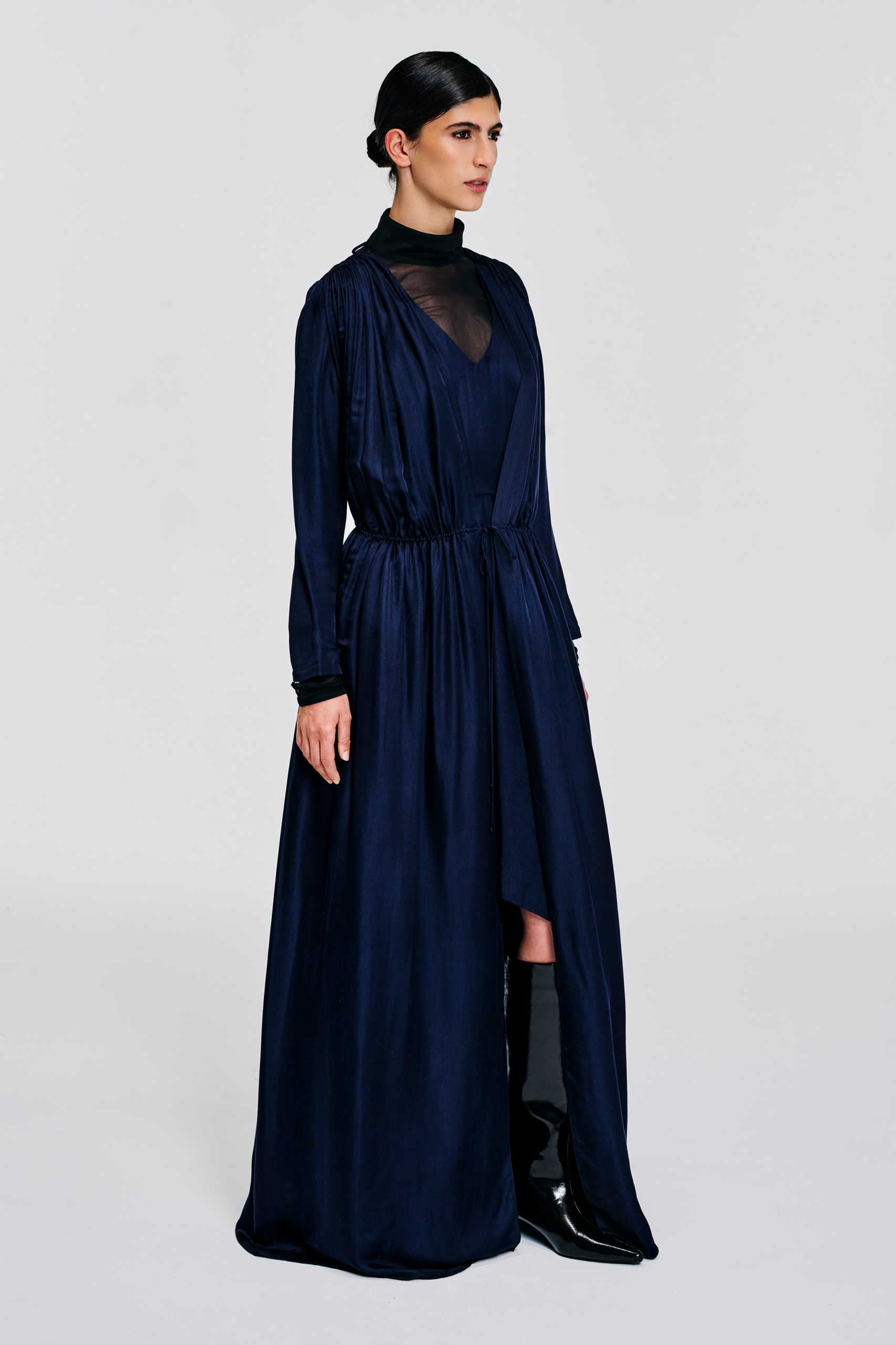 Model wearing a convertible midnight navy silk panel dress with soft front panels by KimC Studio.