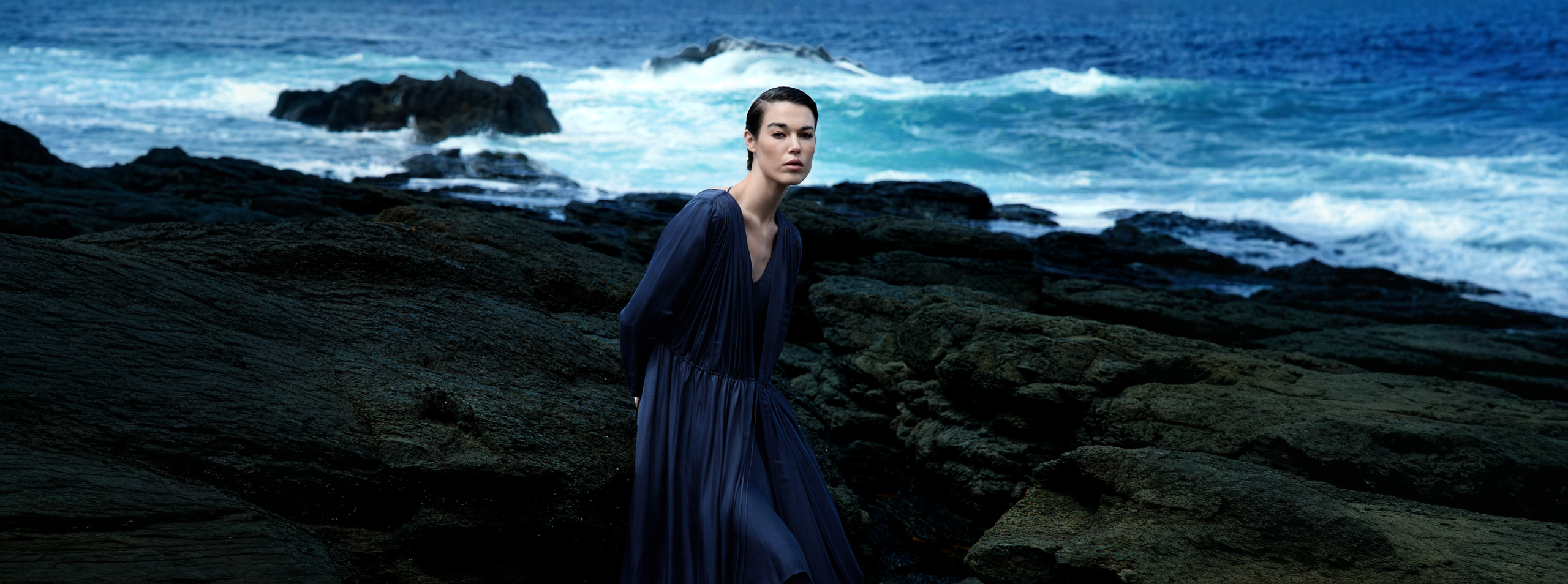 Australian designer womenswear by Kim C Studio featuring a flowing navy dress