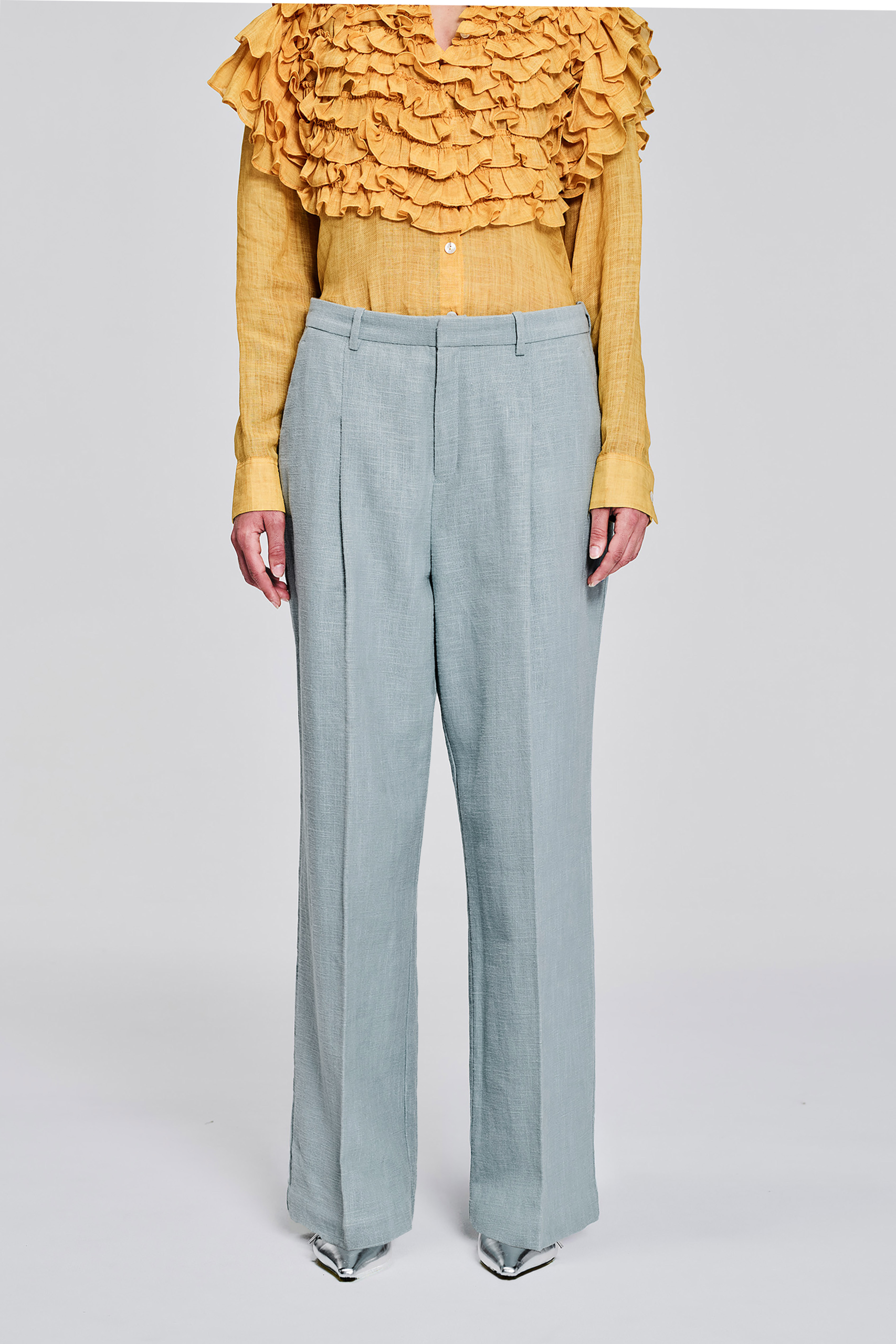 KIM C STUDIO pale blue linen straight-leg trousers front view