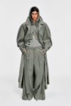 Detail view of full-length sage hooded cotton trench coat