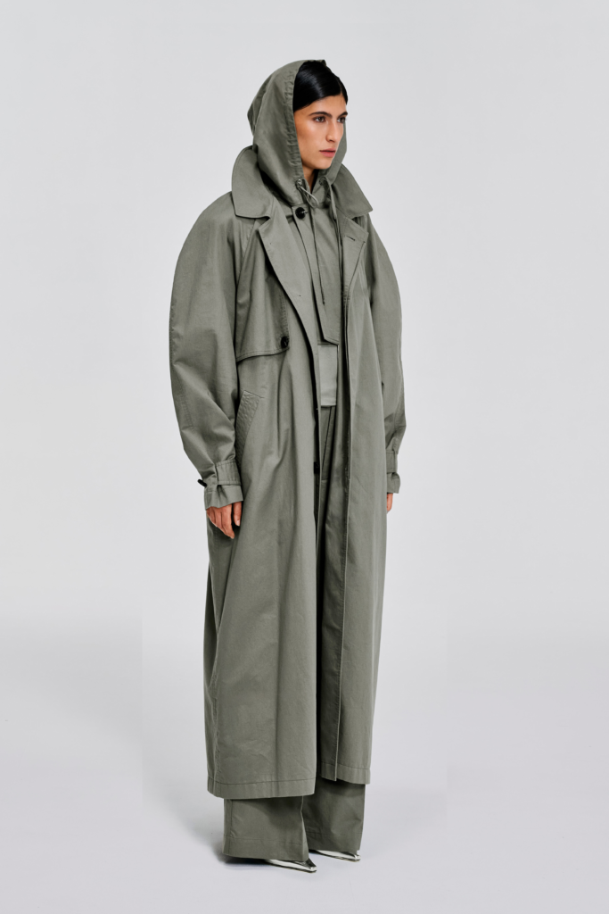 Style view of full-length sage hooded cotton trench coat